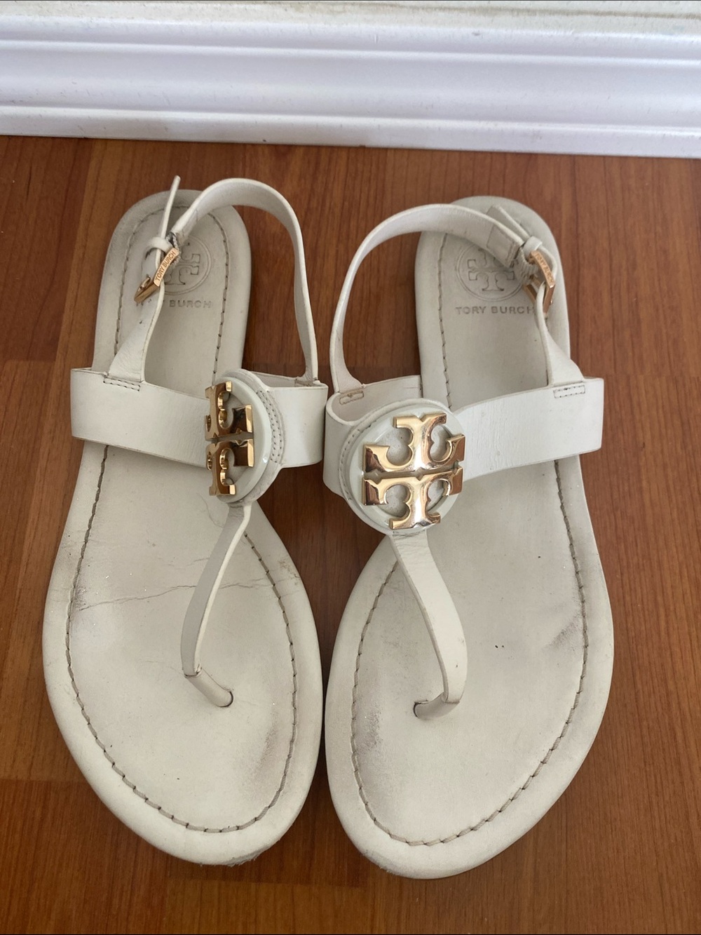 Tory Burch Cream Leather Logo Thong Sandals with Gold Emblem